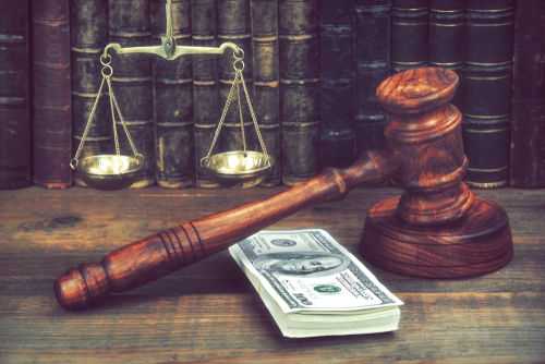 Gavel money scales of justice law books