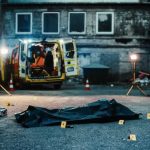 Ignored Warning, Six Dead — TERRORISM or Rampage? Police investigation at a crime scene with a covered body and evidence markers