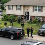 U.S. Citizens NABBED for TREASON — ISIS Shocker! Law enforcement officers conducting a raid in a residential neighborhood