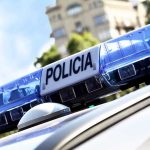 Close-up of a police cars light bar with the word POLICIA
