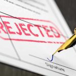 NATO Power SHIFT — SHOCKING SNUB! Rejected stamp on a document with pen.