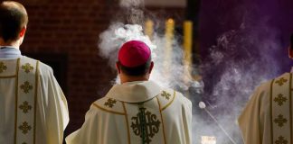 Rome’s Rule TESTED — Celibacy Crack WIDENS Clergy in ornate vestments during a church service with incense smoke