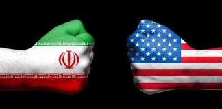 Iran THROWS DOWN Dare — WHAT Trump Vows Fists painted as Iran and United States flags facing each other