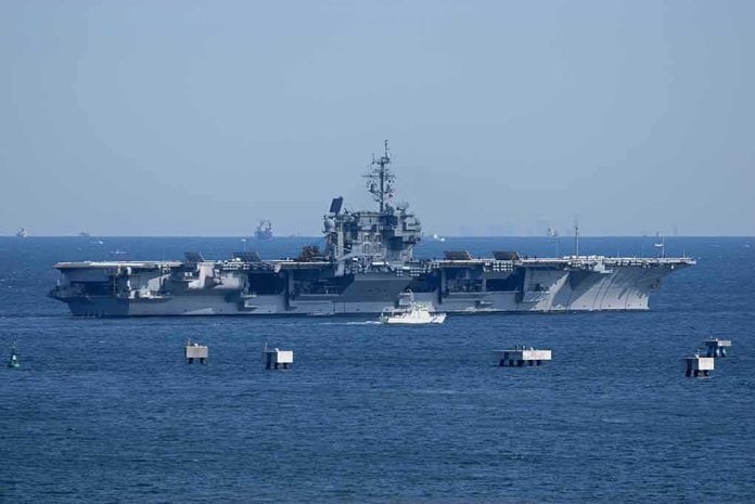 shutterstock_1314966416 Aerial view of multiple naval ships operating in the ocean