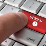 Trade War ESCALATES — Europe BLINDSIDED A finger pressing a red DENIED button on a computer keyboard
