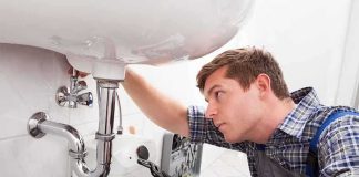 TWISTED! — Home Repair Visit Ends In DEATH A plumber working under a sink with tools