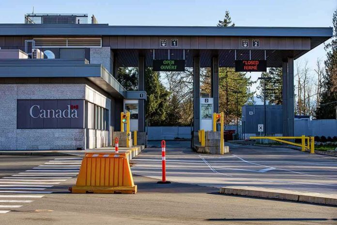 shutterstock_1615370530-1 Canada border crossing booths with open and closed lane signs