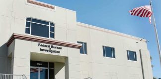 NEW DETAILS — FBI HQ Blast Sparks TERROR Probe FBI office building with entrance steps and American flag