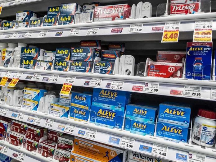 shutterstock_2000015819 Pharmacy shelf with over-the-counter pain relievers