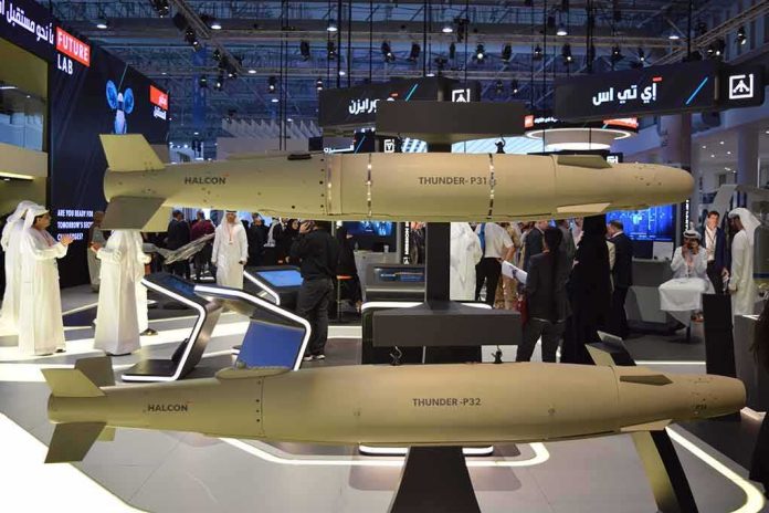 shutterstock_2197606529 Two large guided munitions displayed at a defense trade show