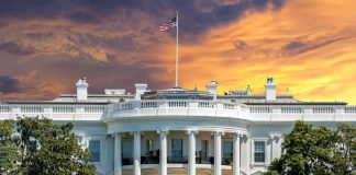 DEFENSE GIANT Bankrolls TRUMP’S New Demand! The White House with vibrant sunset sky.