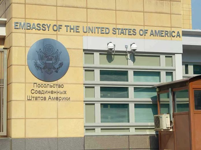 shutterstock_1180000336 United States Embassy exterior with signage and seal