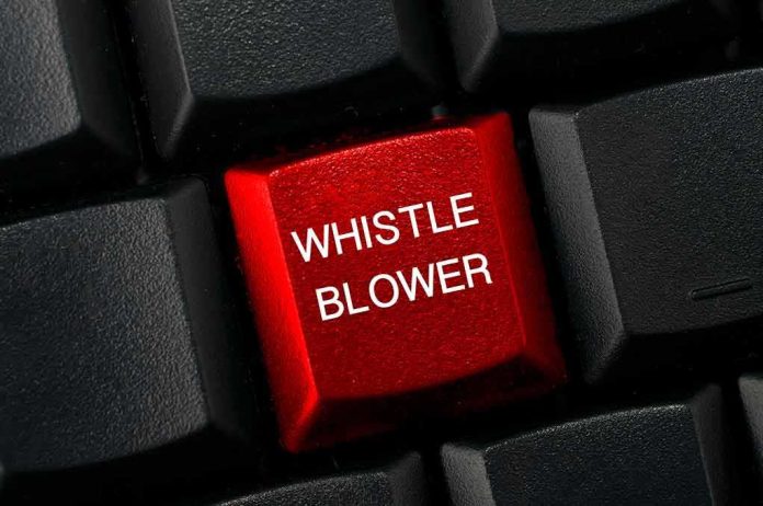 shutterstock_1454462453 Red keyboard key with whistle blower label