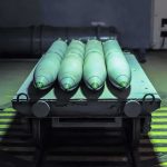 Rebel Republican TORPEDOES Trump’s Pick Green missiles on a wheeled cart in an industrial bay