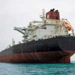 Large oil tanker anchored in calm sea