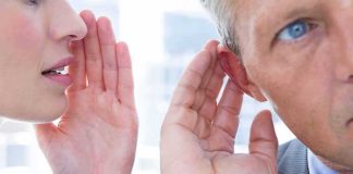 Viral Clip UPENDS Frontrunner — What’d She SAY? woman whispering to man who cups his ear
