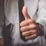 TOP Dem Insider Backs GOP — STUNNING Reason WHY! Hand giving a thumbs-up gesture in business attire