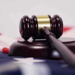 Supreme Court Blocks TRUMP — What The Ruling DIDN’T Say Judge’s gavel on a base over an American flag