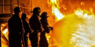 Towering Fire ENGULFS Major Factory — What REALLY Burned Firefighters battling a large blaze with a hose