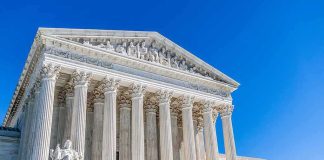 Look What Trump Just Brought To The SUPREME Court Supreme Court building with tall marble columns under a clear blue sky
