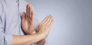 Staffer Rebuffed A Top Democrat — His Reply Was Called HARASSMENT Person's hands making a stop gesture