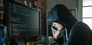 She Called A Murdered Boy’s Father — What She Said Was CHILLING Person in hoodie using computer and phone at desk