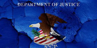 DOJ Seizes Crypto — HAMAS Caught Off-Guard Department of Justice emblem with eagle on blue cracked texture