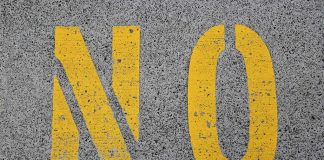 Billions VANISH — Mayor REFUSES to TESTIFY! Yellow letters NO painted on gray asphalt
