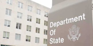 Travel ALERT — State Dept Issues NO-GO WARNING Department of State sign outside office building