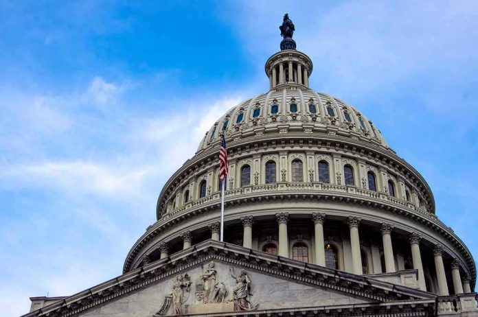 shutterstock_1862909170 U.S. Capitol dome with American flag