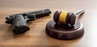 Third Circuit Drops a Gun-Rights BOMBSHELL Judge's gavel and handgun on wooden table