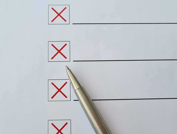 shutterstock_2183845197 Checklist with red X marks and a silver pen