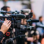 Labour’s Mutiny: Starmer in the Crosshairs Video cameras on tripods at a media event