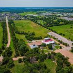 They Wanted To Build –Then Someone Asked What’s In The Soil Aerial view of rural landscape with roads, fields, and scattered buildings