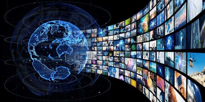shutterstock_2644480887 Digital globe with curved wall of multimedia screens