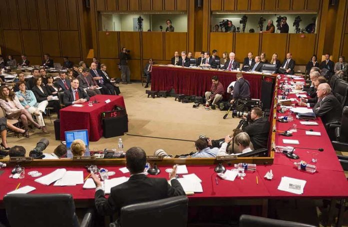 shutterstock_387761506-3 Patrick Leahy and Samuel Alito at a Senate hearing with committee and press present