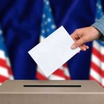 100 Fake Voters In One Florida County — Look Who Filed The FORMS Hand casting ballot into box with U.S. flags in background