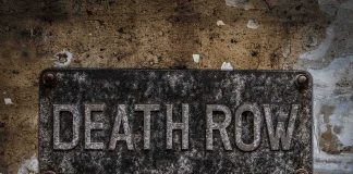 Witnesses Put A Man On Death Row For DECADES — Then He Walked OUT Rusty metal DEATH ROW sign on a worn concrete wall