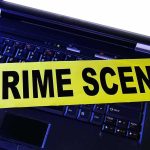 University Student Murder: $10M Bail Set Laptop keyboard with yellow crime scene tape across it