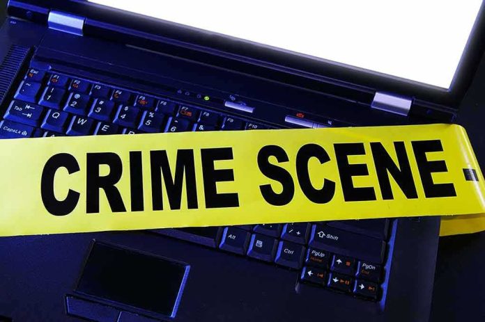 Laptop keyboard with yellow crime scene tape across it