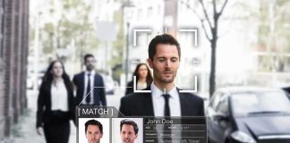 SUSPICIOUS Mistaken IDENTITY Hits State ELECTION man in suit walking on city street with facial recognition overlay