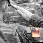 Trump Goes To BAT For OUR Troops — Look Who OBJECTS Soldier saluting with an American flag patch on sleeve