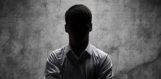 Democrat Nominee DESERTED By The Last Man You’d Expect silhouetted man in dress shirt with arms crossed