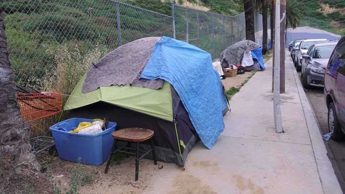 Tent encampment along a city sidewalk
