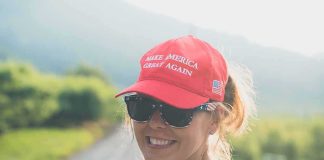 Trump’s New Pick Was Told To Lose Her MAGA Hat — Her ANSWER woman in red cap and sunglasses smiling outdoors