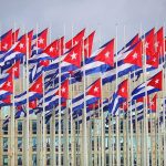 EXPOSED: Mamdani’s Cuba Adviser Is STILL Helping Communists Cuban flags on numerous flagpoles