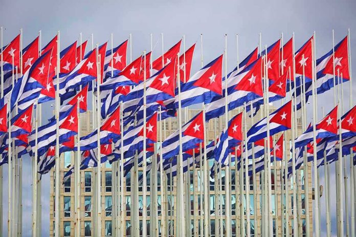 shutterstock_1660056481 Cuban flags on numerous flagpoles