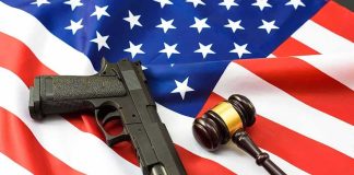 Gun Rights Gone For LIFE Over A DUI? Look Who Said YES Handgun and judge’s gavel on American flag