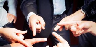 ACCUSATIONS FLY — Trump Ambassador Up For SALE? Group of hands pointing fingers at each other