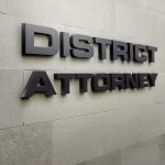 DA In The HOT SEAT Over Botched Case — Look What He NEVER Read District Attorney office wall sign